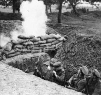 3 British soldiers in trench under fire during World War 1