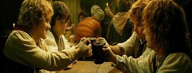 hobbits-raising-a-pint-tolkienbirthdaytoast